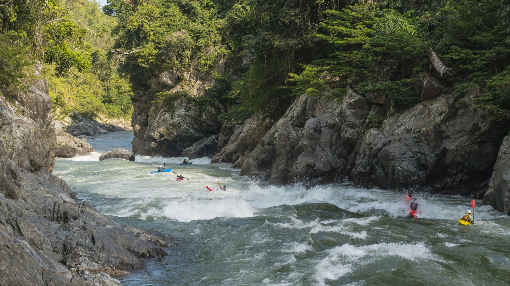 Kayak Beginner to Kayaker Course Group Going Down the River